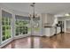 Dining area with bay windows adjacent to the kitchen at 2031 Greyfield Nw Dr, Kennesaw, GA 30152