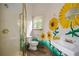 Charming bathroom featuring a unique hand painted sunflower design, vintage style fixtures, and a walk-in shower at 1006 Arbor Ne Trce, Atlanta, GA 30319