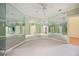 Spacious bonus room featuring large mirrors and ample natural light at 1006 Arbor Ne Trce, Atlanta, GA 30319