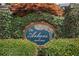 The Arbors at Lenox Park community sign nestled in lush greenery and mature trees at 1006 Arbor Ne Trce, Atlanta, GA 30319