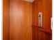 Residential elevator with wood paneling and easy-to-use controls at 1006 Arbor Ne Trce, Atlanta, GA 30319