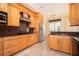 Well-equipped kitchen featuring stainless steel appliances, gas cooktop, granite countertops, and tile flooring at 1006 Arbor Ne Trce, Atlanta, GA 30319