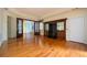 Spacious living room features hardwood floors, built-in bar, and french doors to the sunroom at 1006 Arbor Ne Trce, Atlanta, GA 30319