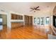 Spacious living room featuring hardwood floors, built-in cabinets, and access to an outdoor space at 1006 Arbor Ne Trce, Atlanta, GA 30319