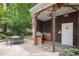 Poolside bar area with a built-in grill and seating, creating the perfect spot for outdoor cooking and entertaining at 1006 Arbor Ne Trce, Atlanta, GA 30319