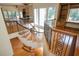 A beautiful curved staircase featuring hardwood steps and an ornate, wrought-iron railing that adds elegance to the home's interior at 1006 Arbor Ne Trce, Atlanta, GA 30319