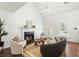 Bright living room featuring a fireplace, modern decor, and hardwood flooring throughout at 1334 Gates Se Dr, Atlanta, GA 30316