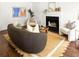 Bright living room featuring a fireplace, modern decor, and hardwood flooring throughout at 1334 Gates Se Dr, Atlanta, GA 30316