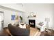 Bright living room featuring a fireplace, modern decor, and hardwood flooring throughout at 1334 Gates Se Dr, Atlanta, GA 30316