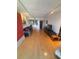 Inviting living room with hardwood floors, modern track lighting, and an open layout to the kitchen at 199 14Th Ne St # 1512, Atlanta, GA 30309