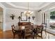 Cozy dining area features hardwood floors and traditional furniture at 2713 Misty Rock Cv, Dacula, GA 30019