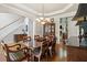 Well-lit dining room with hardwood floors and traditional decor at 2713 Misty Rock Cv, Dacula, GA 30019