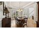 Dining area showcasing hardwood floors and an abundance of natural light at 2713 Misty Rock Cv, Dacula, GA 30019