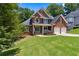 Charming brick home with a well-manicured lawn and inviting curb appeal at 2713 Misty Rock Cv, Dacula, GA 30019
