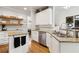 Kitchen with stainless appliances, granite countertops, and eat-in breakfast bar at 2713 Misty Rock Cv, Dacula, GA 30019