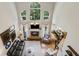 This grand living room has vaulted ceilings, lots of natural light and an open floor plan at 2713 Misty Rock Cv, Dacula, GA 30019