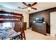 Bedroom boasts bunk beds, a chalkboard wall, and plenty of storage at 1574 Leonard St, Hampton, GA 30228