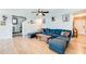 Spacious living room with ample seating, wood flooring, and stylish décor, creating a welcoming atmosphere at 1574 Leonard St, Hampton, GA 30228
