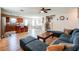 Spacious living room featuring hardwood floors, comfortable seating and an open floorplan at 1574 Leonard St, Hampton, GA 30228