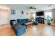 Open concept living room boasts luxury vinyl floors and lots of natural light at 1574 Leonard St, Hampton, GA 30228