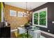 Elegant dining area with modern lighting, stylish decor, and natural light at 1821 Huntington Hills Nw Ln, Atlanta, GA 30309