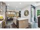 Open concept kitchen with stainless steel appliances and a view into the living room at 1821 Huntington Hills Nw Ln, Atlanta, GA 30309