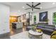 Open-concept living space with hardwood floors, natural light, and modern furnishings at 1821 Huntington Hills Nw Ln, Atlanta, GA 30309