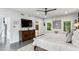 Comfortable main bedroom with dark hardwood floors and view into the main bathroom at 1821 Huntington Hills Nw Ln, Atlanta, GA 30309