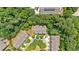 Aerial view showcasing the property's location, the surrounding neighborhood, and lush green trees at 4349 Kousa Rd # 4, Austell, GA 30106