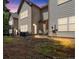 The backyard of the property, with a concrete patio and a patch of grass at 4349 Kousa Rd # 4, Austell, GA 30106