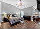 Comfortable bedroom featuring a ceiling fan, wood floors, and stylish furniture at 4349 Kousa Rd # 4, Austell, GA 30106