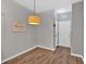 Cozy dining area with hardwood floors, light fixture, and stylish decor at 4349 Kousa Rd # 4, Austell, GA 30106