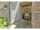 Inviting entryway featuring a glass door with decorative wreath and stone accents at 4349 Kousa Rd # 4, Austell, GA 30106