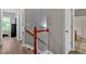 View of the hallway, and a partial view of the stairway at 4349 Kousa Rd # 4, Austell, GA 30106