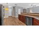 Modern kitchen with stainless steel appliances, wooden cabinets, and hardwood flooring at 4349 Kousa Rd # 4, Austell, GA 30106