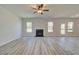 Bright living room featuring a fireplace and neutral walls at 443 Lothbury Ave, Locust Grove, GA 30248