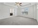 Neutral bedroom with tray ceilings and bright windows at 6761 Cedar Glen Rd, Peachtree Corners, GA 30360