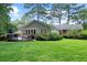 Beautiful backyard featuring a deck perfect for outdoor entertaining and a lush lawn at 1959 Audubon Ne Dr, Atlanta, GA 30329