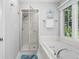 Stylish bathroom features a luxurious soaking tub with jets and a separate glass shower at 1959 Audubon Ne Dr, Atlanta, GA 30329