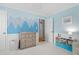 Sweet blue Bedroom with mountain mural and wood furnishings at 1959 Audubon Ne Dr, Atlanta, GA 30329