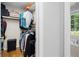 Spacious closet featuring ample storage with organized hanging clothes, and shelves at 1959 Audubon Ne Dr, Atlanta, GA 30329