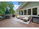 Large deck with seating, grill, and string lights at 1959 Audubon Ne Dr, Atlanta, GA 30329
