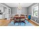 Lovely dining room with hardwood floors, chandelier and bright window for lots of light at 1959 Audubon Ne Dr, Atlanta, GA 30329