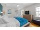 Comfortable main bedroom with a window, neutral color palette, and ample natural light at 1959 Audubon Ne Dr, Atlanta, GA 30329