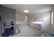 Spacious bedroom featuring a play structure and comfortable bed, bathed in soft natural light at 293 Ironwood Dr, Stockbridge, GA 30281
