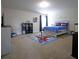 Nicely decorated bedroom with carpet and a large window at 293 Ironwood Dr, Stockbridge, GA 30281