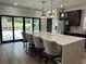 Open kitchen with stainless steel appliances and a large island at 293 Ironwood Dr, Stockbridge, GA 30281