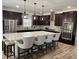 Kitchen with stainless steel appliances, large island with chairs at 293 Ironwood Dr, Stockbridge, GA 30281