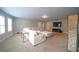 Expansive rec room features plush carpet, recessed lighting, and a sectional sofa with ample seating at 293 Ironwood Dr, Stockbridge, GA 30281
