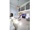 Bright and airy living space with staircase, high ceilings, and a modern aquarium at 293 Ironwood Dr, Stockbridge, GA 30281